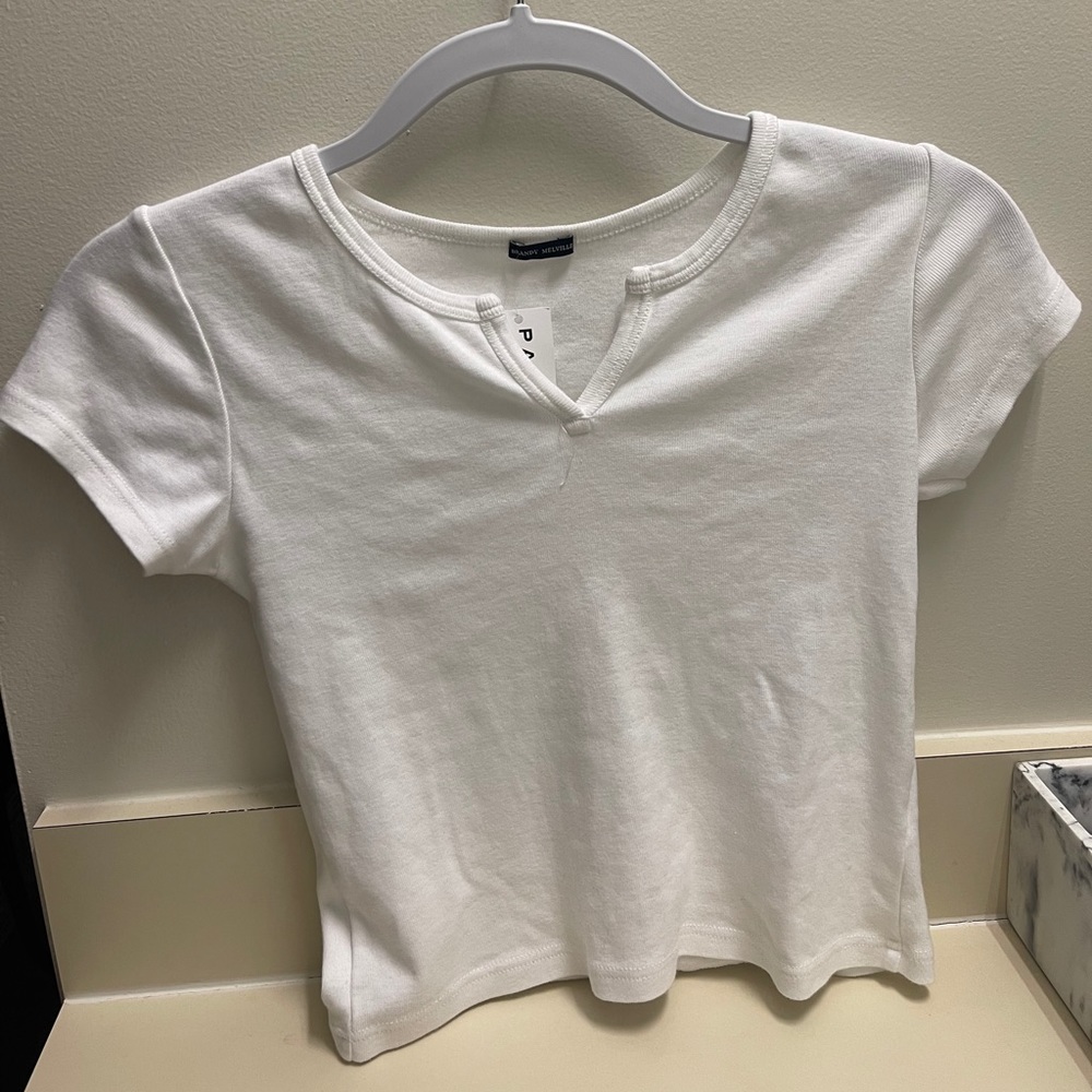 white slightly cropped t-shirt with small v cut